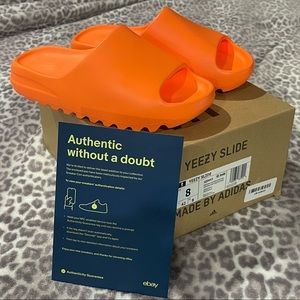 Yeezy Slide Enflame Orange. Mens size 8. Brand new in box.